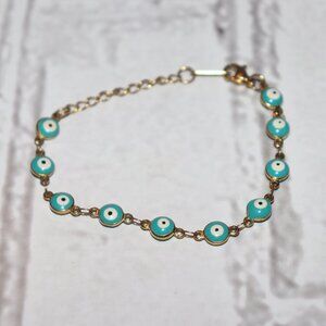 Beautiful gold and turquoise evil eye bracelet 7.25"